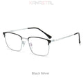 Unisex titanium prescription glasses with anti-reflective lenses and blue light filter.