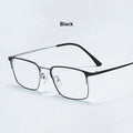 Unisex titanium prescription glasses with anti-reflective lenses and blue light filter.