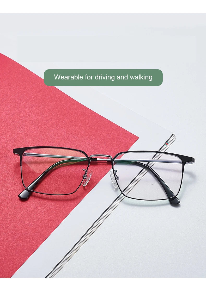 Unisex titanium prescription glasses with anti-reflective lenses and blue light filter.